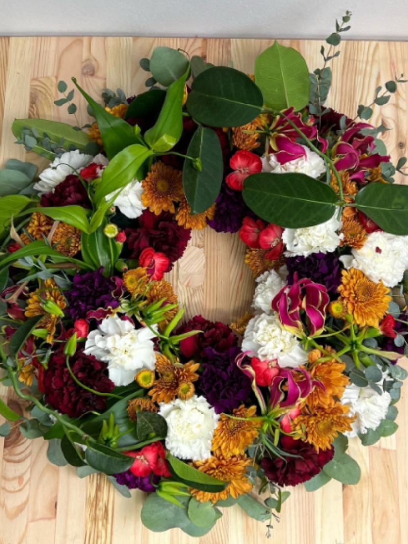 Krans - røde, hvide & orange farver med ranke